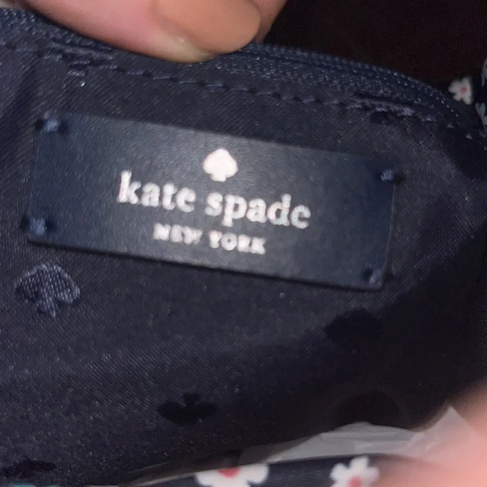 kate spade New York Carley flap backpack WKR00432